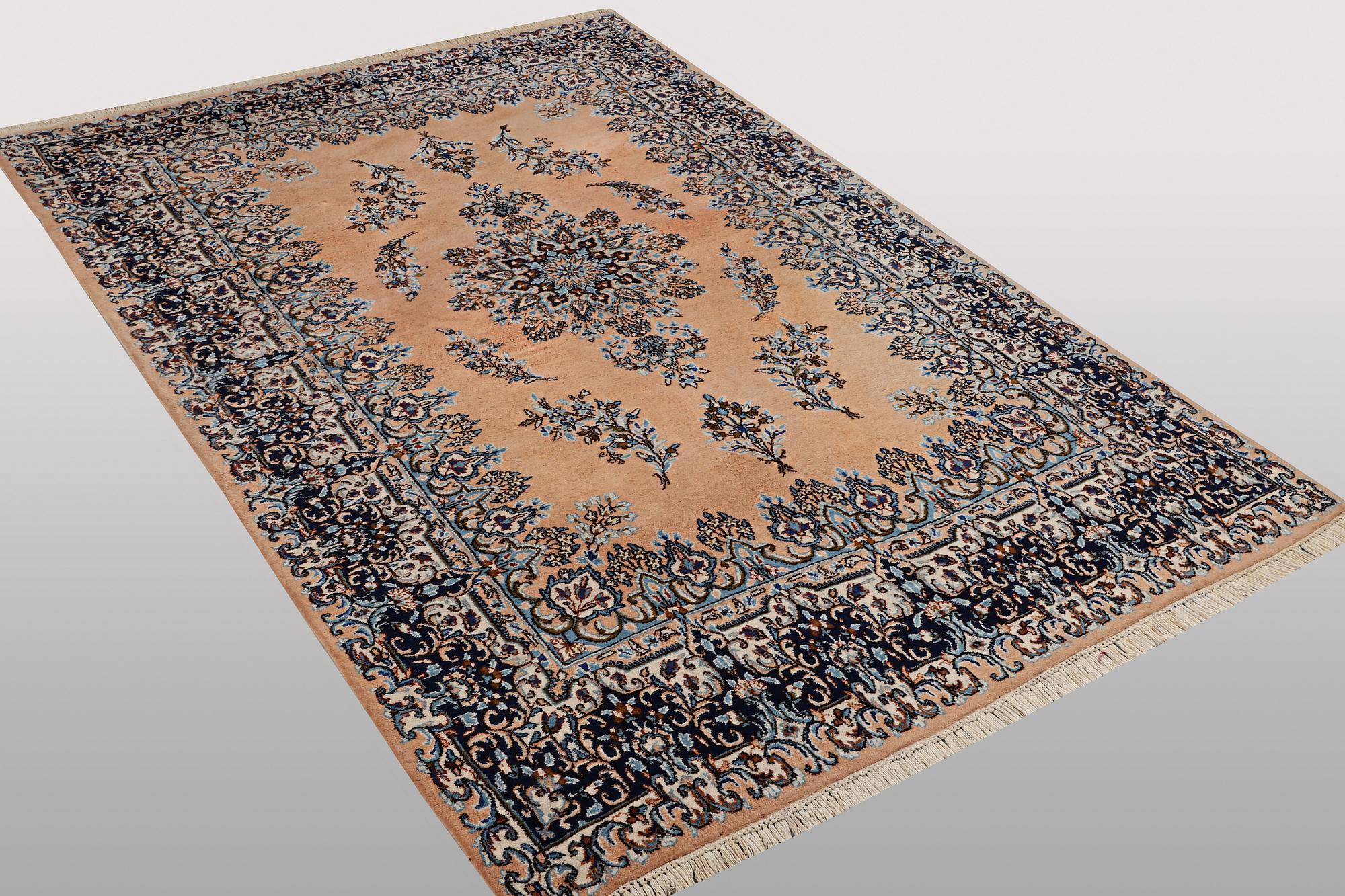 A carpet, Kerman, ca 352 x 188 cm.