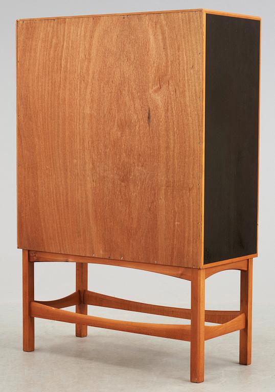 A Curt Blomberg mahogany cabinet, the doors, sides and top with painted panels, ca 1954.