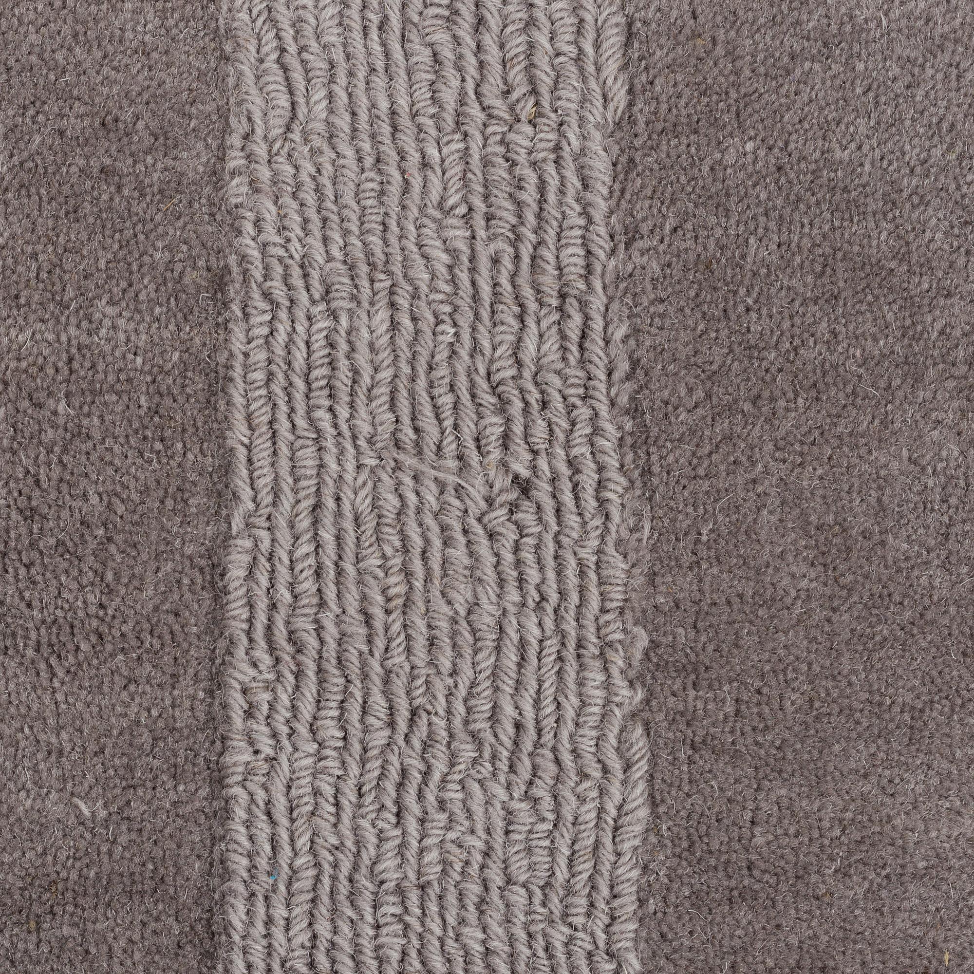 A Layered "Wool Cubes" carpet, 390x620 cm.