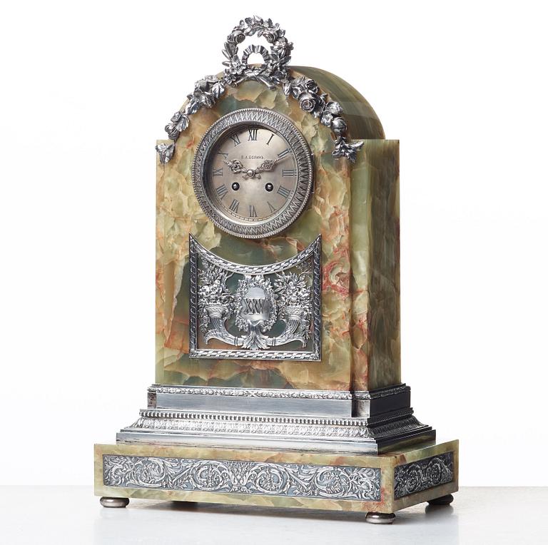 A silver jubilee hardstone and silver mantle clock by WA Bolin, Moscow 1912-1017.
