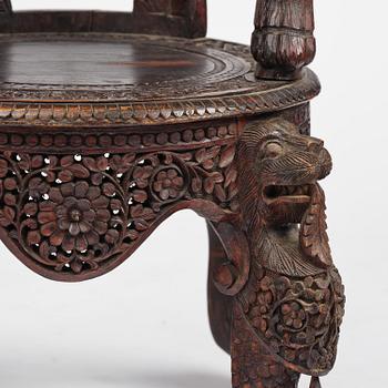 A pair of carved 'blackwood' armchairs, Bombay presidency, British Raj, circa 1880.