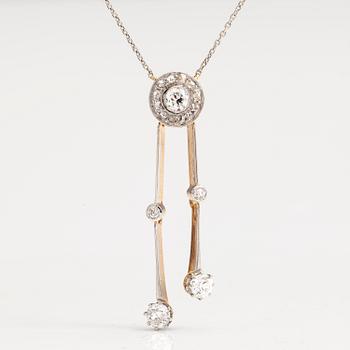 A platinum and yellow gold necklace with old cut diamonds ca. 1.00 ct in total and rose cut diamonds.