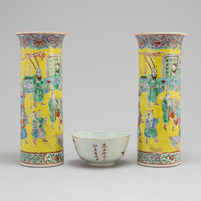 A Chinese famille rose bowl and a pair of sleeve vases, early 20th century.