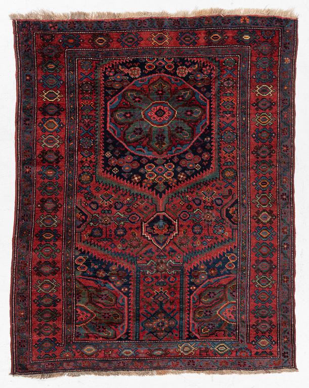 An antique Northwest Persian rug, c. 179 x 143 cm.