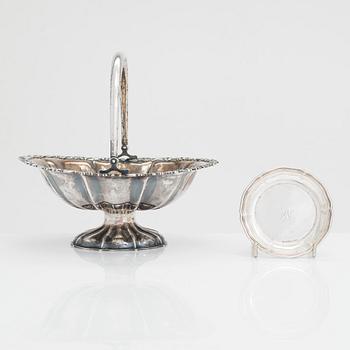 A sweetmeat basket and a 12-piece set of silver coasters, Helsinki and Hämeenlinna, 1920s and 1930s.