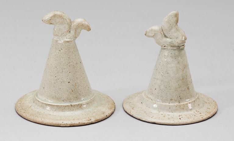 A set of two green glazed vases with covers, Yuan dynasty (1271-1368).