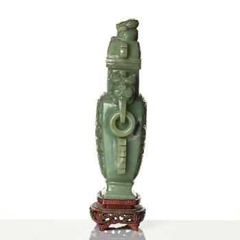 A Chinese archaistic bowenite vase with cover, Republic/20th century.