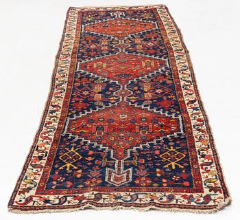 An antique runner, probably Karadja, circa 360 x 98 cm.