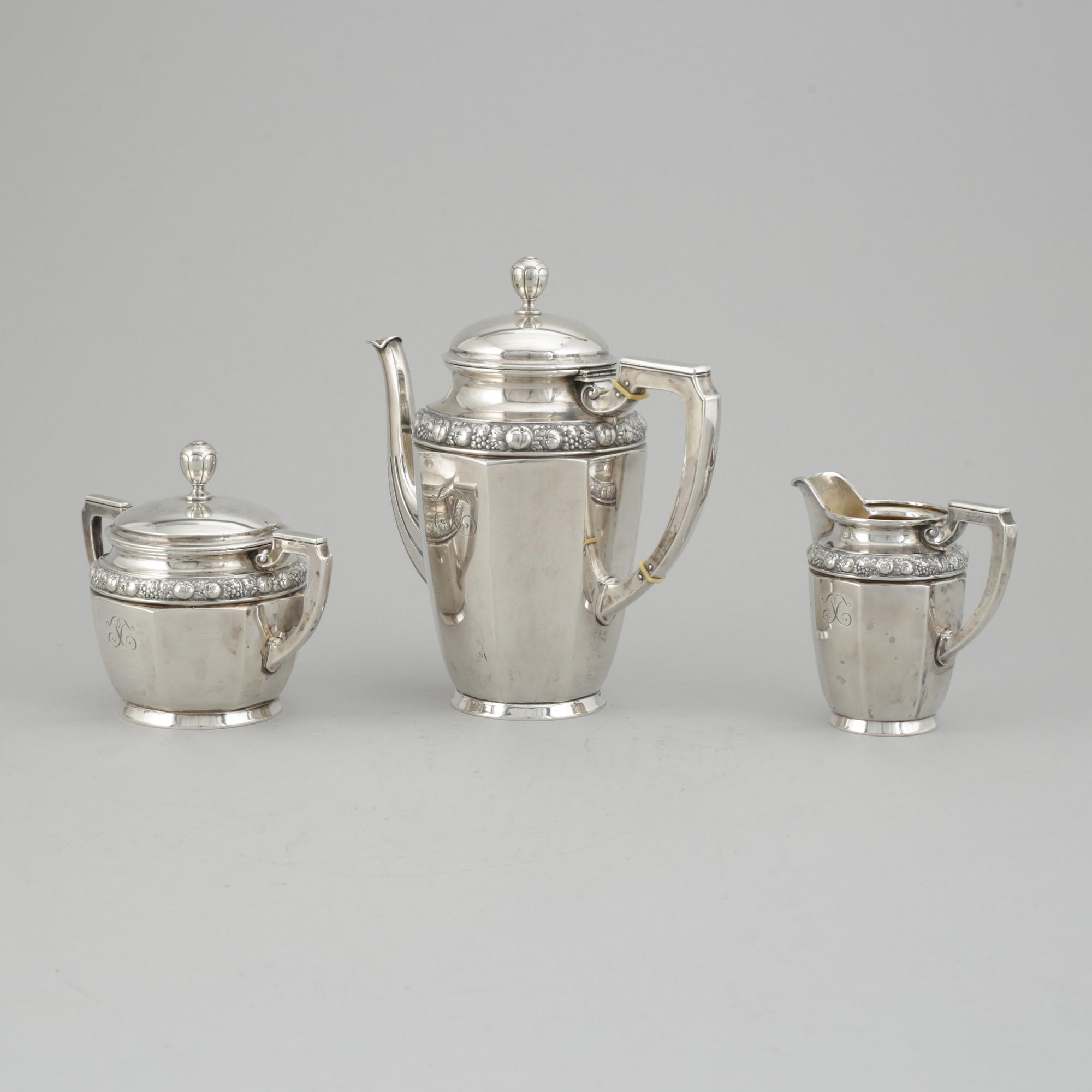 A three pieces silver coffee service from CG Hallberg, Stockholm 1916.