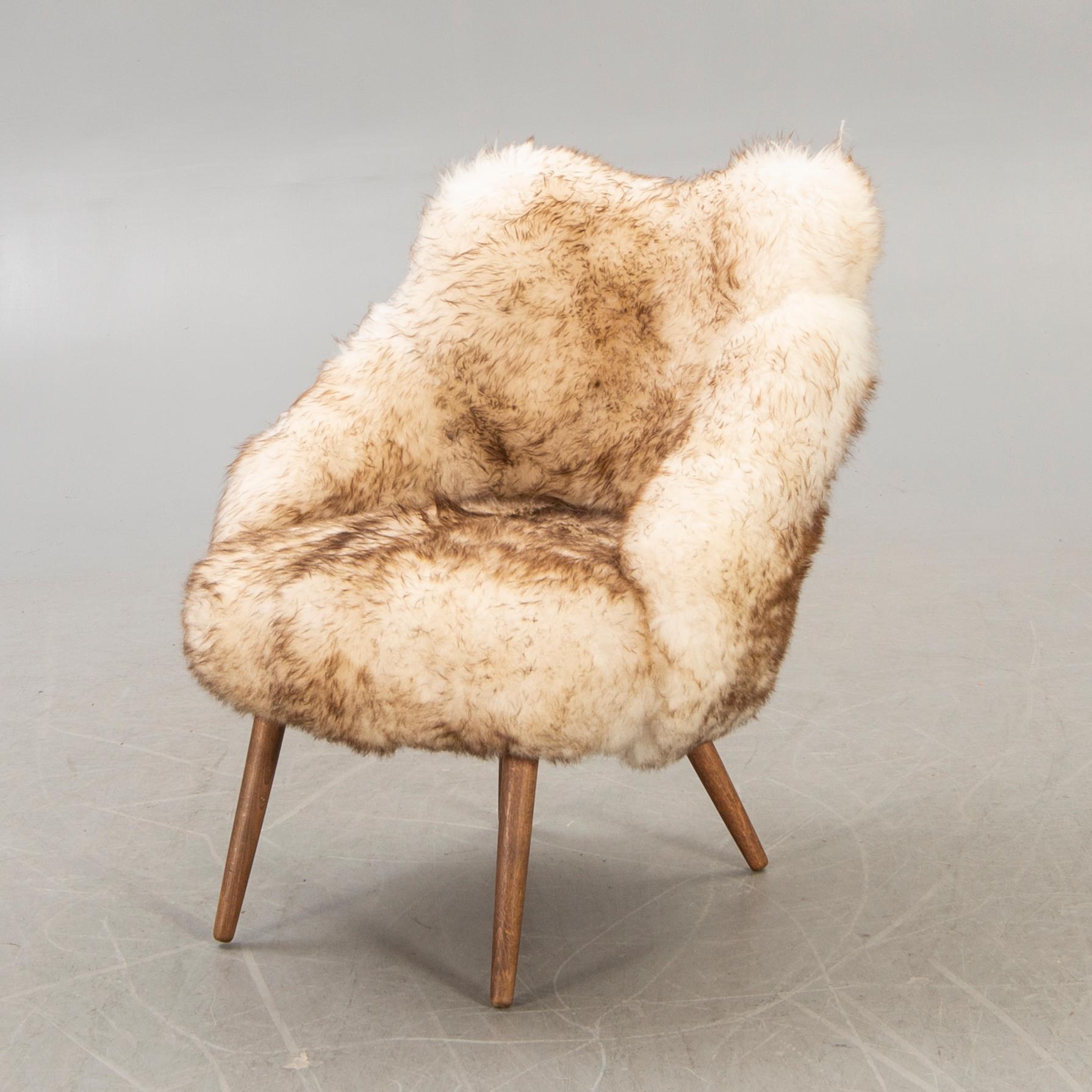 A 1950/60 sheepskin armchair.