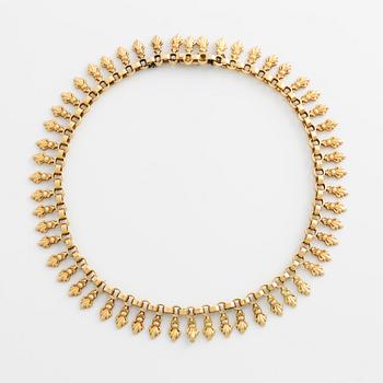 18K gold necklace.