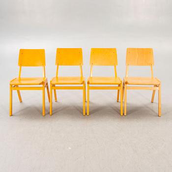 A set of 12 beech stackable chairs mid 1900s.