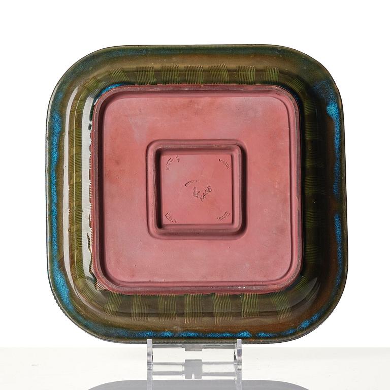 Wilhelm Kåge, a "Farsta" stoneware dish decorated with a face, Gustavsberg Studio, 1957.