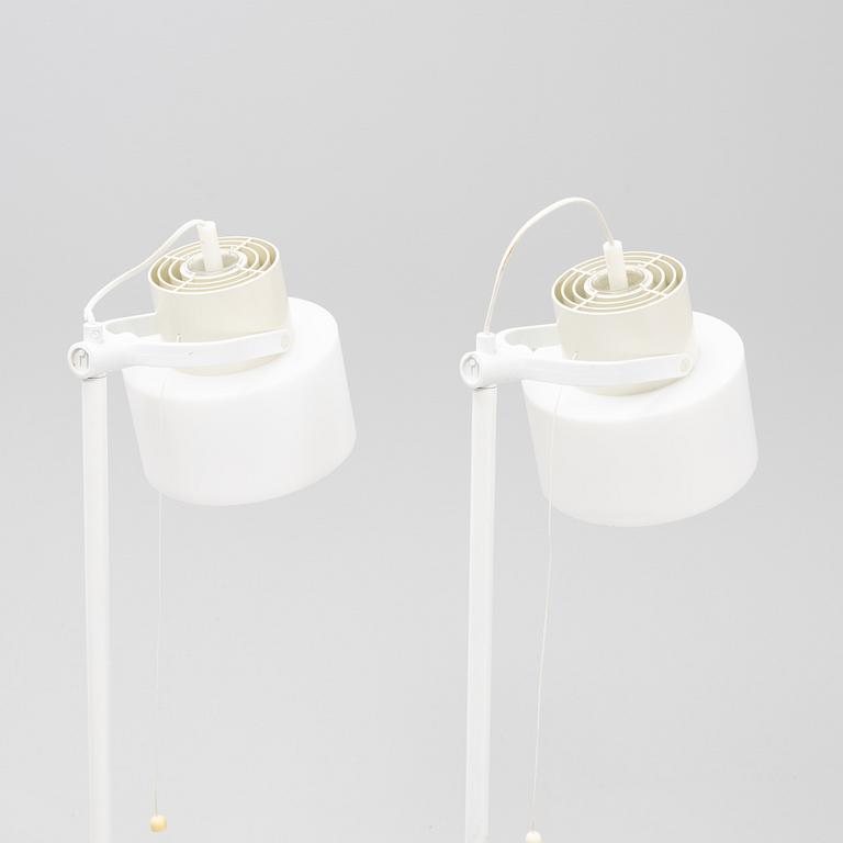 A pair of whithe floor lights, Luxus, Vittsjö.