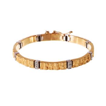 622. A Lapponia 18k gold bracelet with 16 diamonds, Finland 1982.