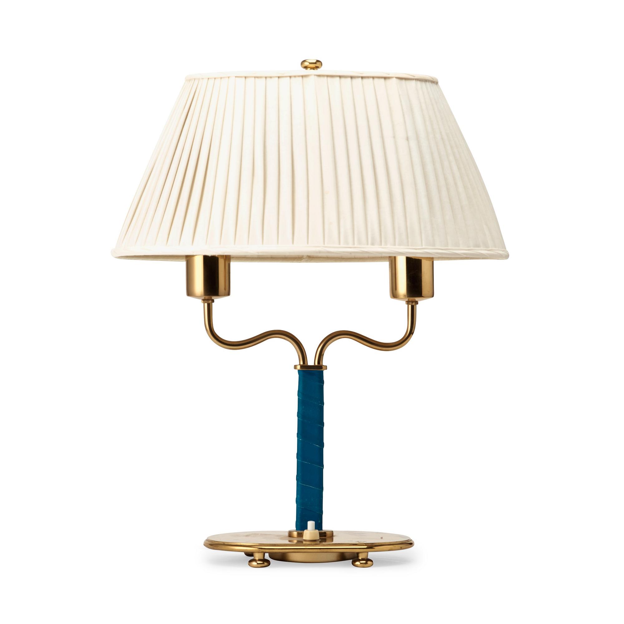 Josef Frank, a brass and blue leather table lamp, Svenskt Tenn, Sweden, model 2388.