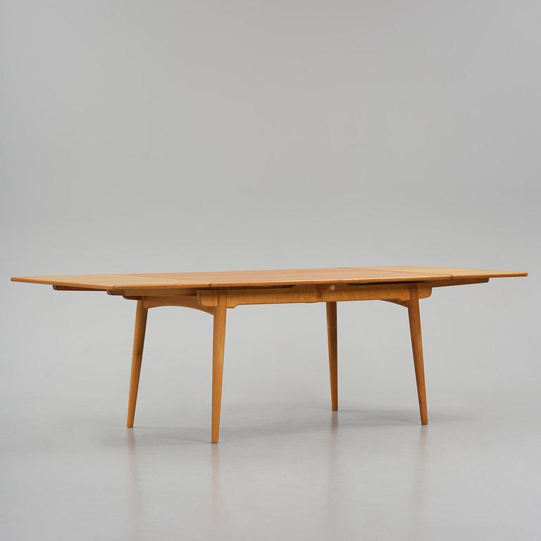 Hans J. Wegner, an "AT-312" dining table, Andreas Tuck, Denmark, 1950s-60s.