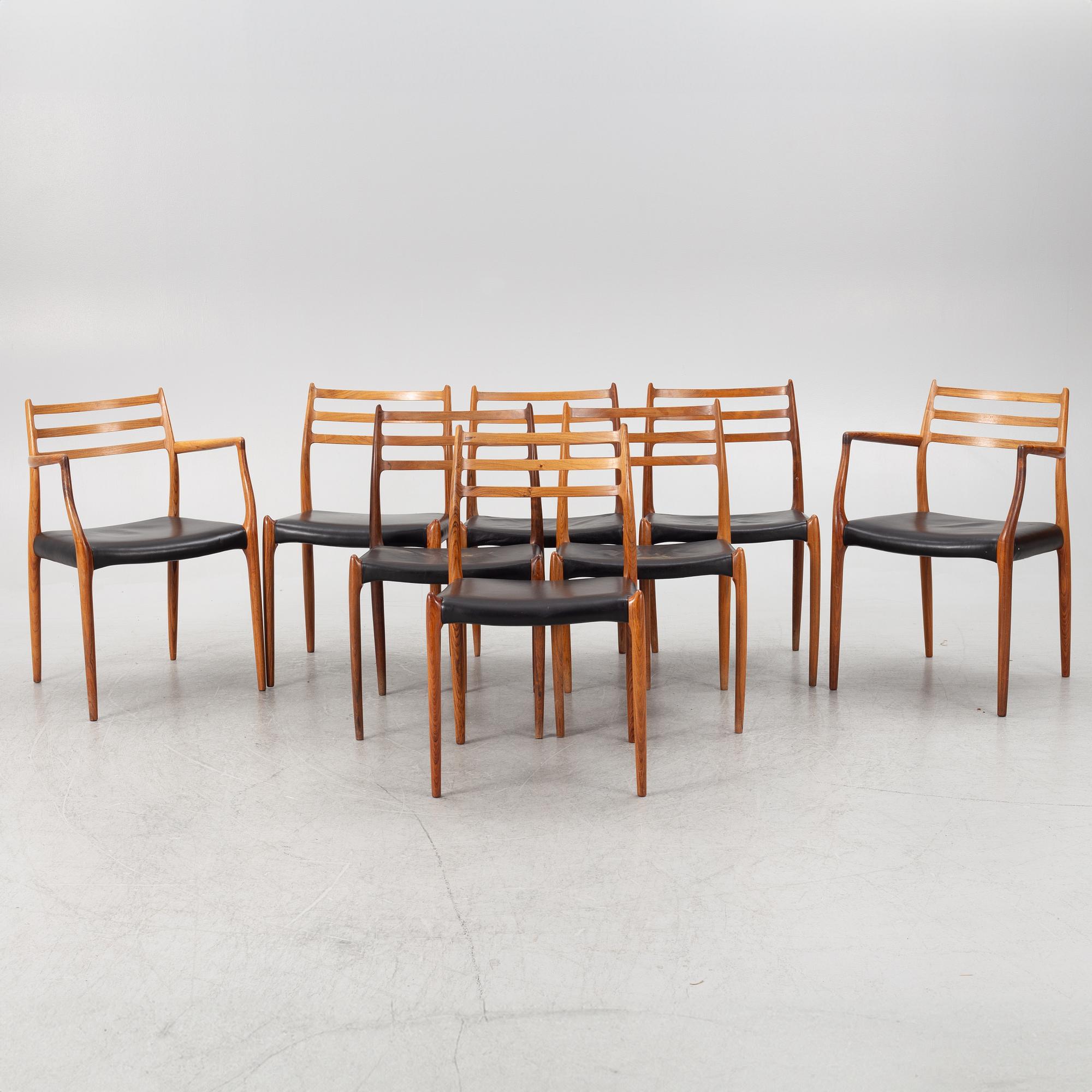 Niels Otto Møller, a rosewood dining table and eight rosewood chairs, Poul Jeppesen & JL Möller, Denmark, 1960's.