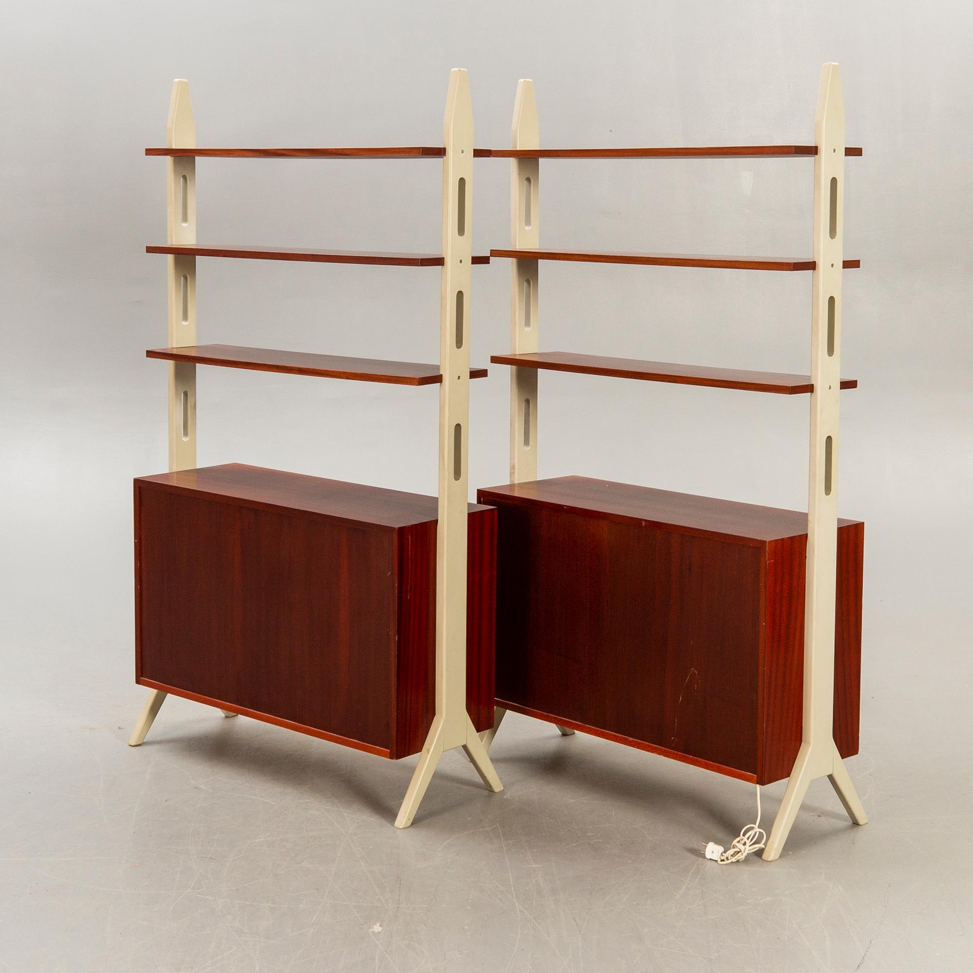 A pair of IKEa "Roxen 1960s mahgony book cases.