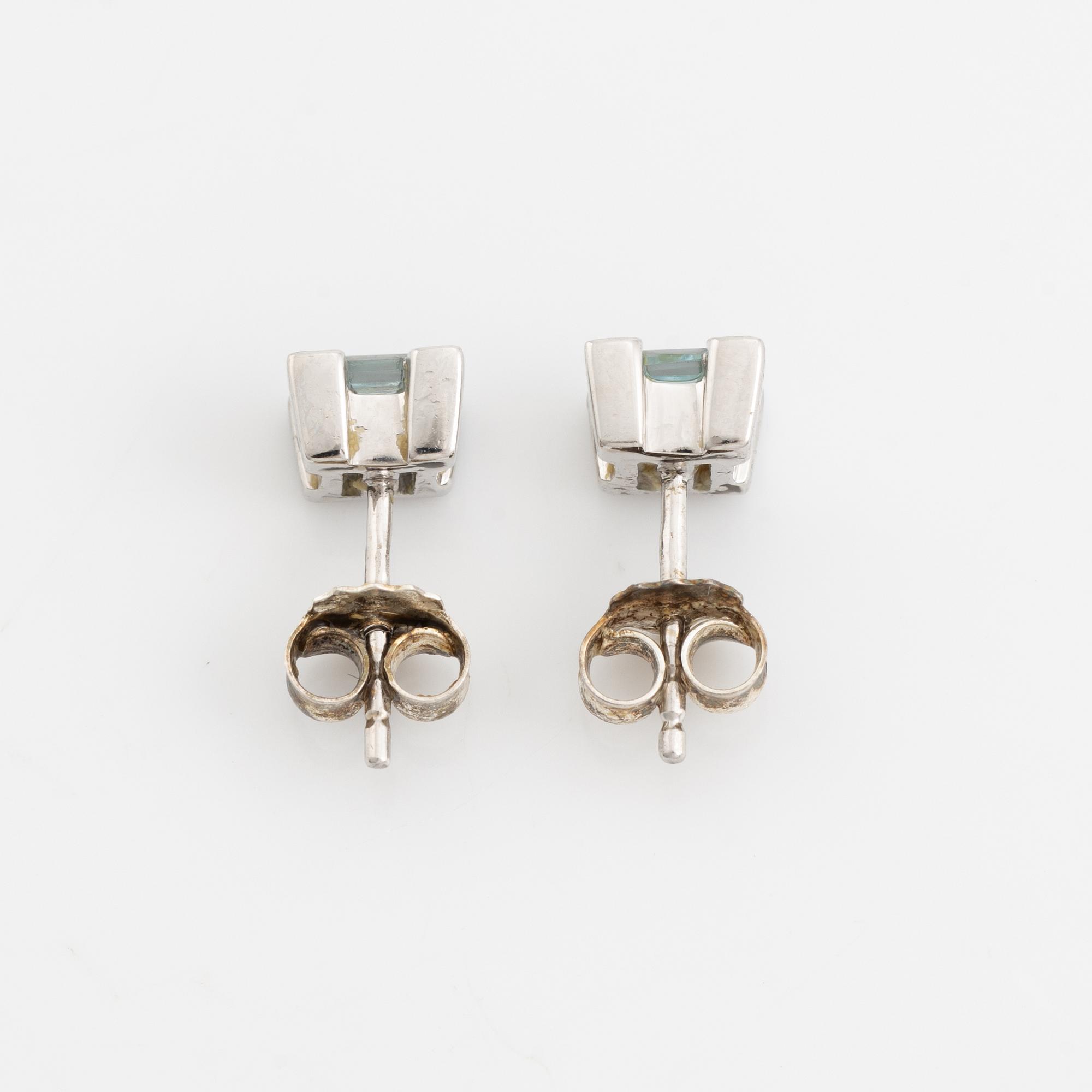 Ring, pendant, and a pair of earrings, 18K white gold with topaz and small diamonds.