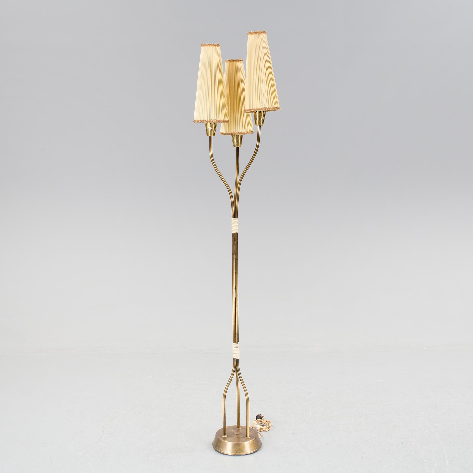 A brass standard lamp, 1950's/60's.