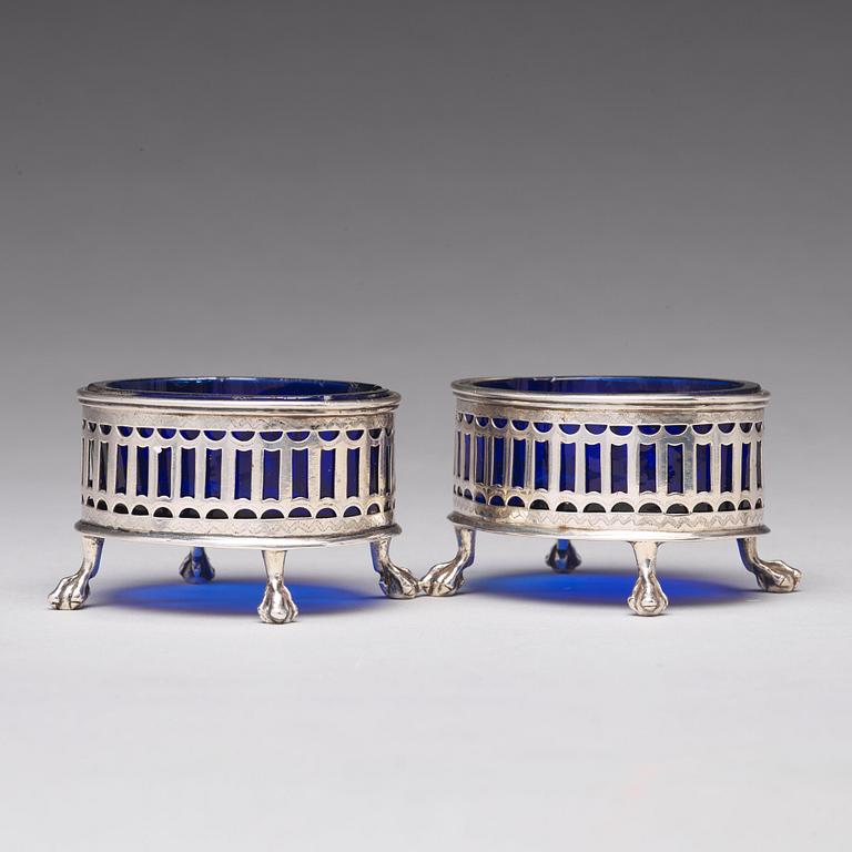 A pair of Swedish 18th century silver and blue glass salt cellars, mark of Pehr Zethelius, Stockholm 1791.