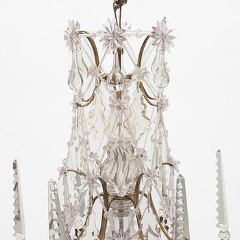 A six-light rococo-style chandelier, late 19th century incorporating older elements.