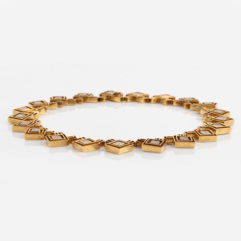 An Ilias Lalounis 18K gold necklace set with eight-cut diamonds.