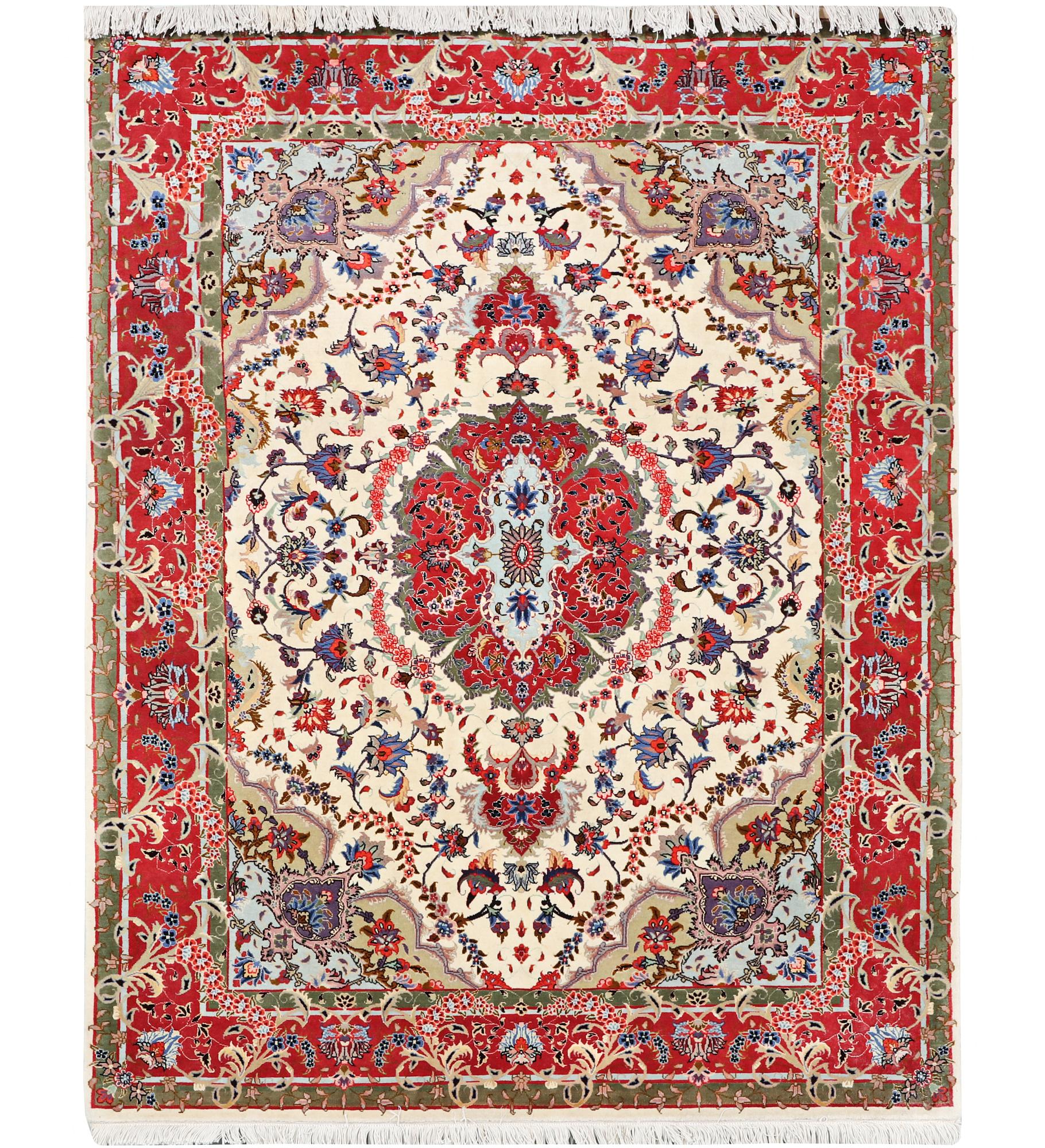 A Tabriz carpet, part silk, 50 raj, c. 204 x 154 cm.