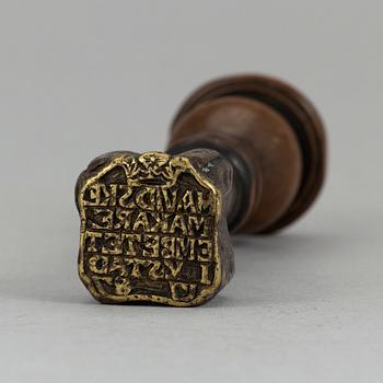 A 18th century glove makers seal.