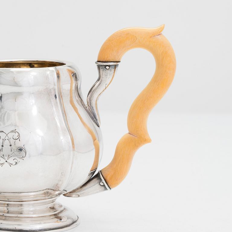 Polish silver teapot and milk jug, maker's mark of Karol Filip Malcz, Warsaw, mid-19th century.