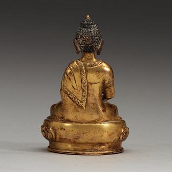 A gilt bronze figure of Buddha Bhaisajyaguru, Qing dynasty (1644-1911).