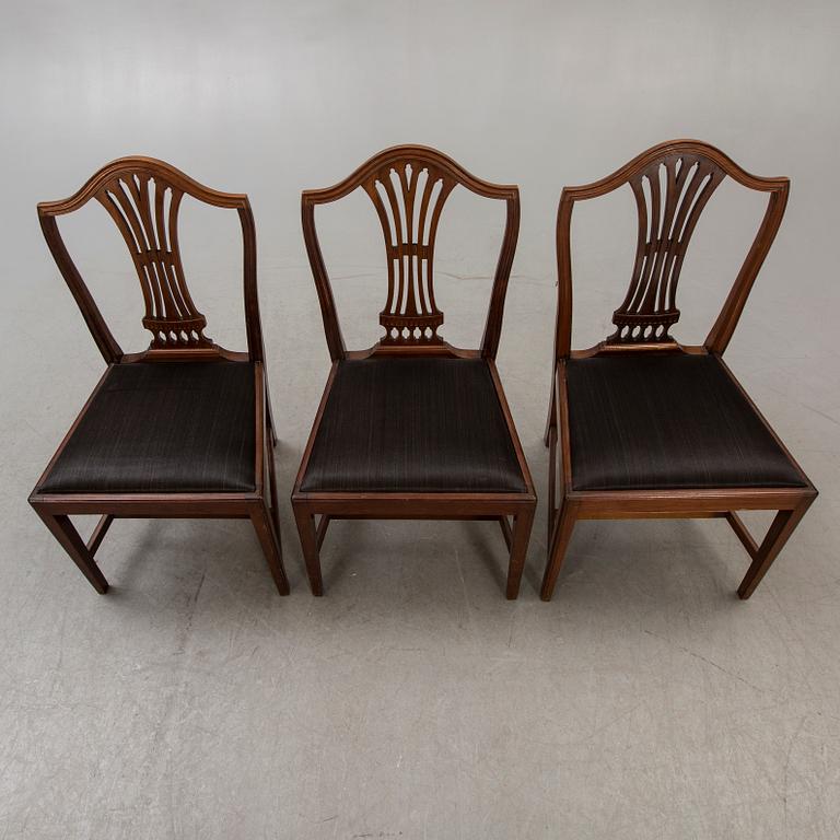 A set of six mahogany Hepplewhite style 20th century chairs.
