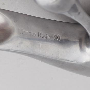 A Manolo Blahnik shoe horn, modern.