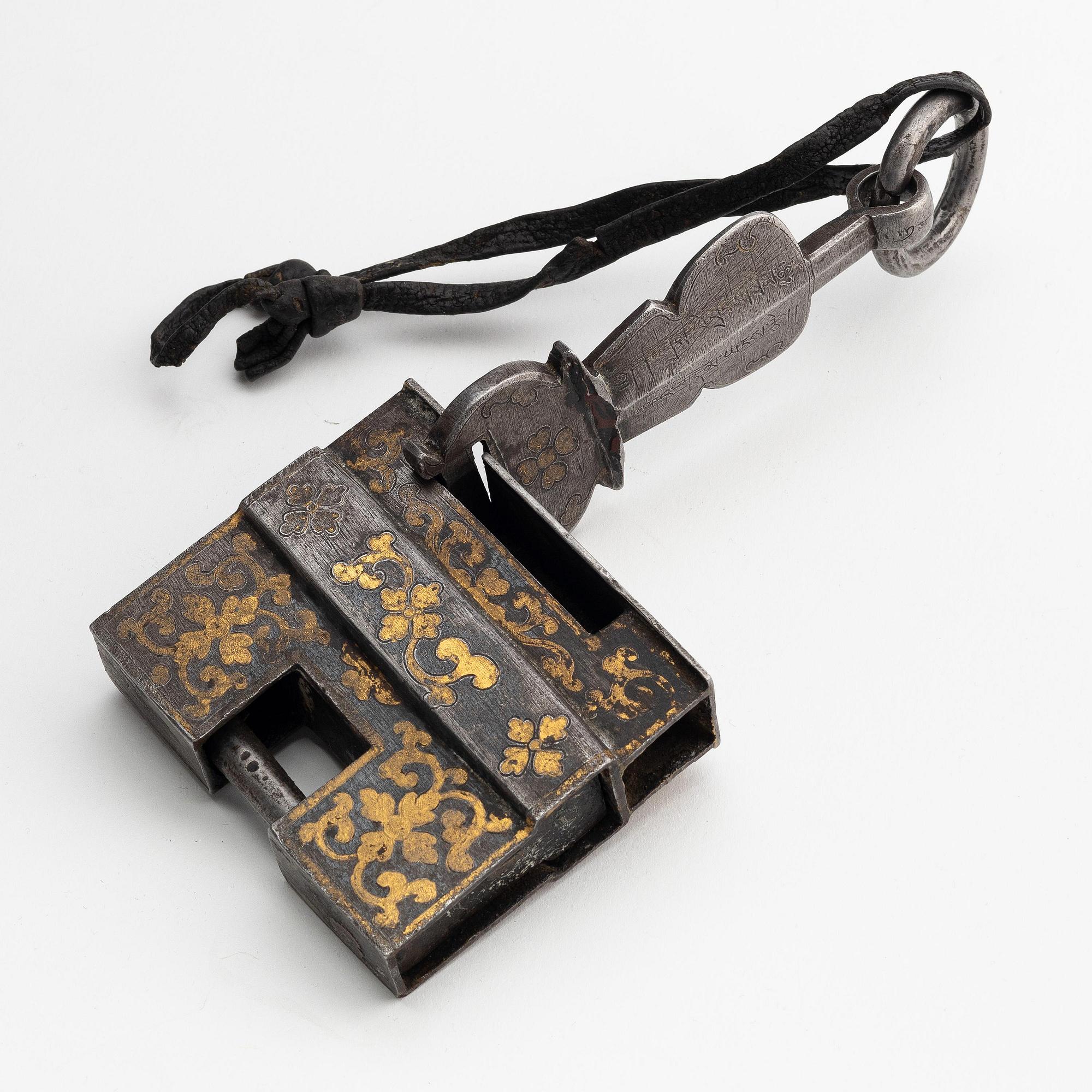 A large iron, silver and gold lock, Tibet, 17th/18th century.