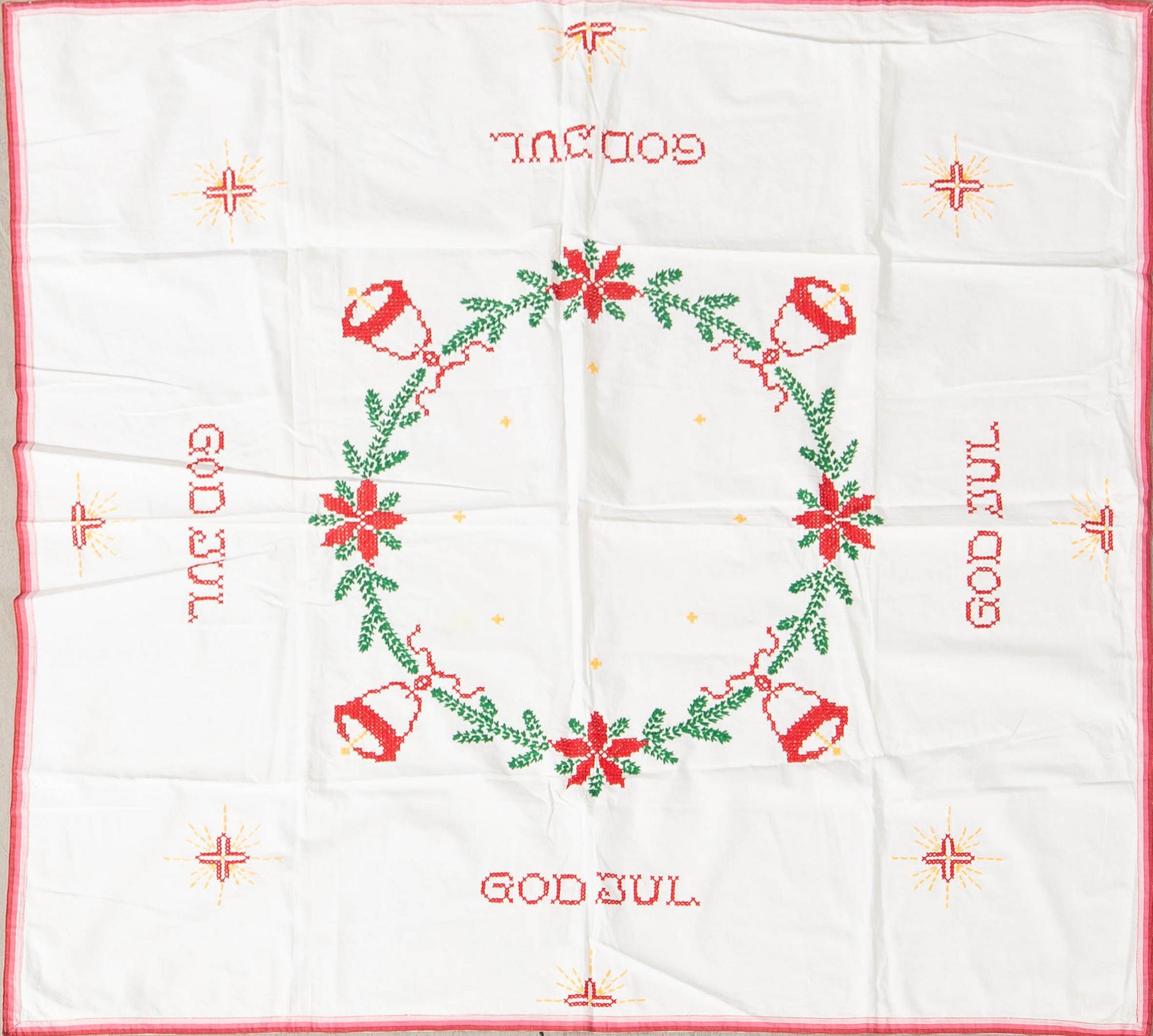 A collection of Christmas tablecloths 12 pcs first half/mid 20th century.
