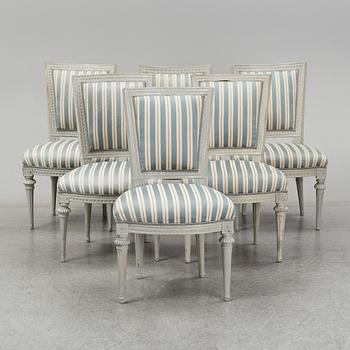 Six (3+2+1) late 18th century Gustavian chairs.
