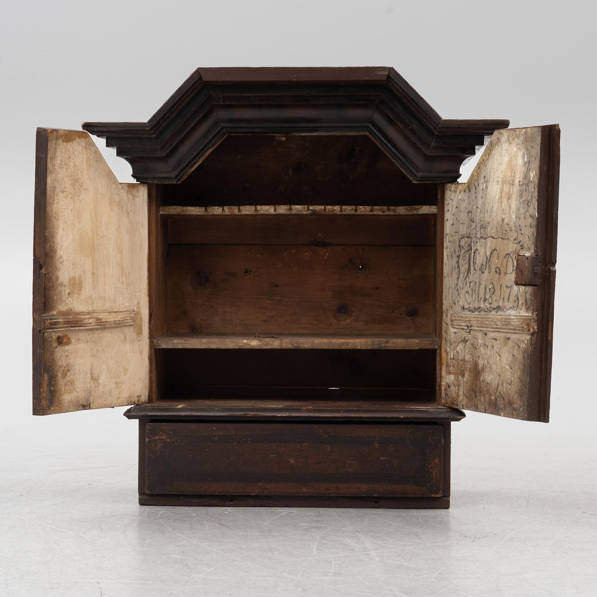 A cabinet, dated 1817.