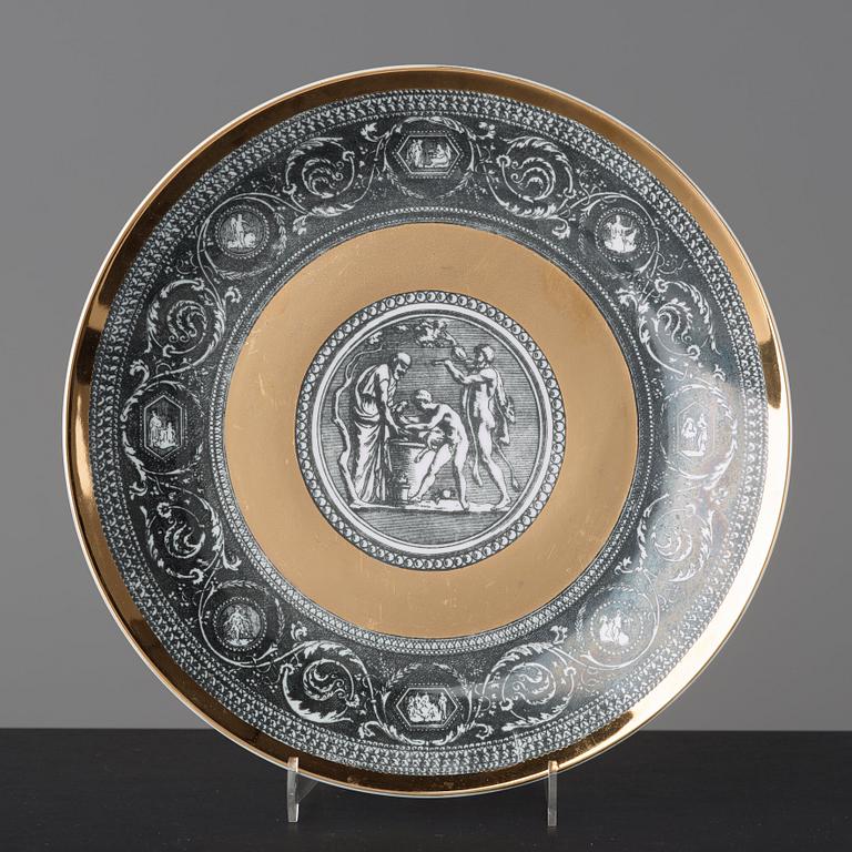 Piero Fornasetti, a set of six "Cammei" porcelain plates, Milano, Italy.