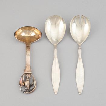 A pair of silver sallad utensils by C.G.Hallberg, Malmö, 1931, and sauce spoon W&S Sorensen, Danmark, early 20th century.