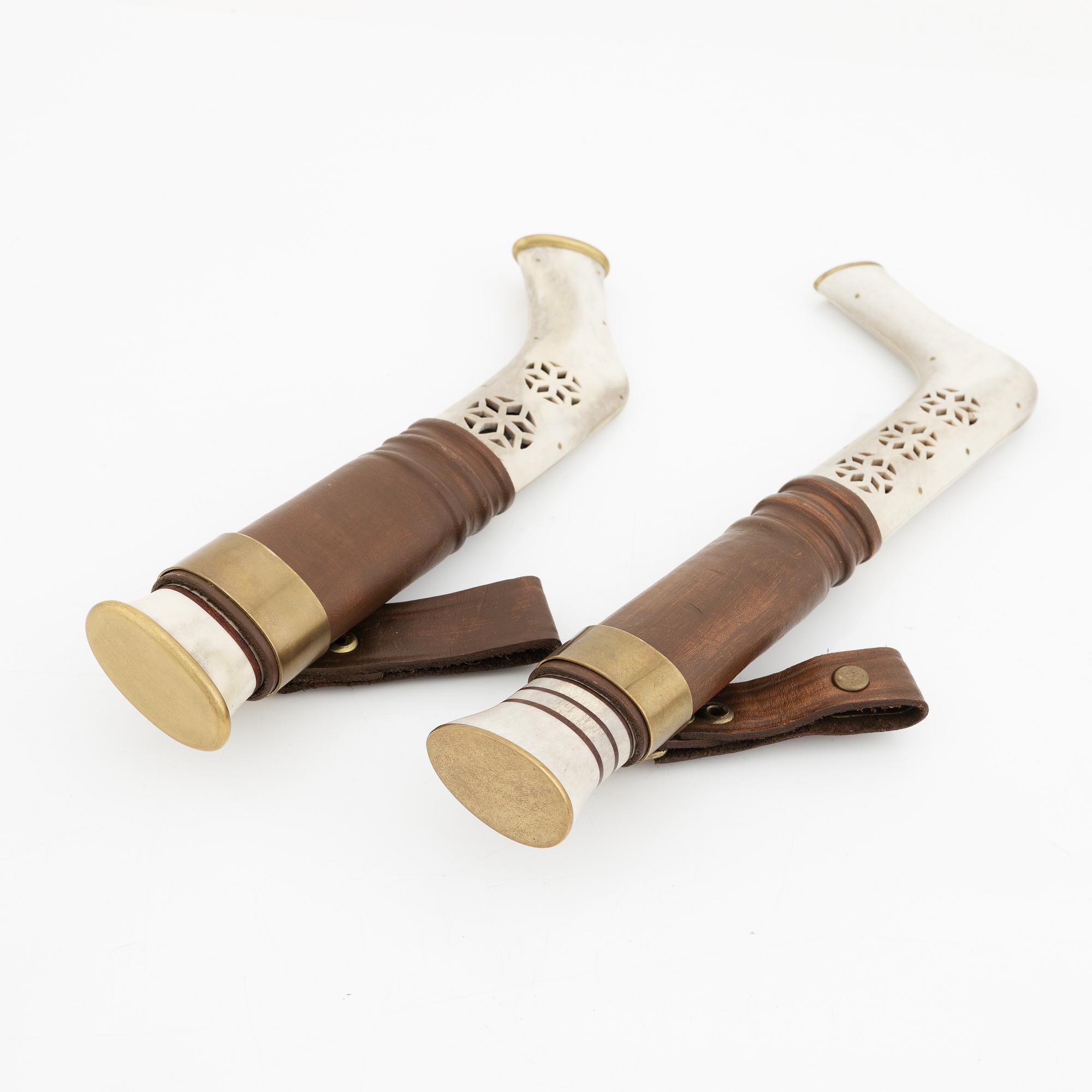 Two reindeer horn knives.