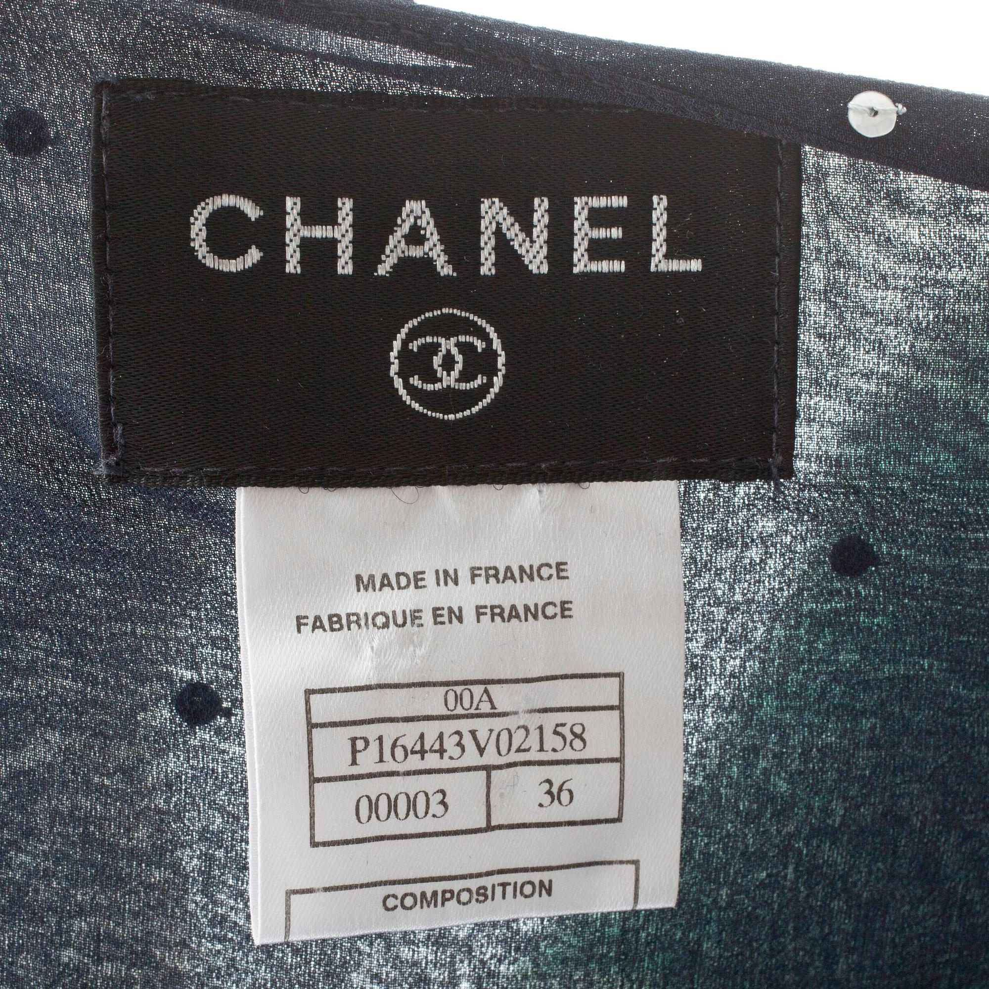 CHANEL, a blue silk and sequin embellished jumpsuit.