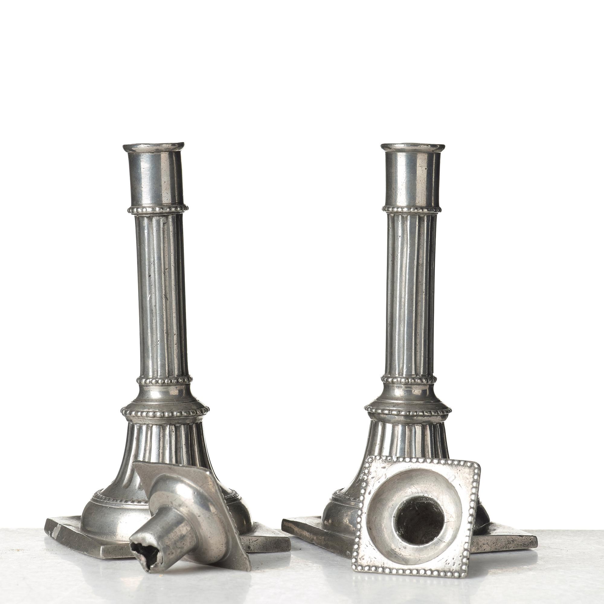 A pair of late Gustavian pewter candelsticks by Daniel Rising, Åbo 1797.