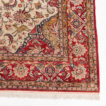 A mid 20th century central persian silk Qum carpet, c. 320 x 212 cm.