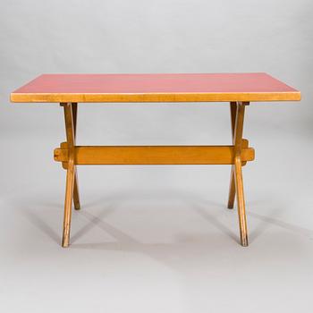 A ILMARI TAPIOVAARA 1940s X-legged table for Keravan Puuteollisuus, Finland.