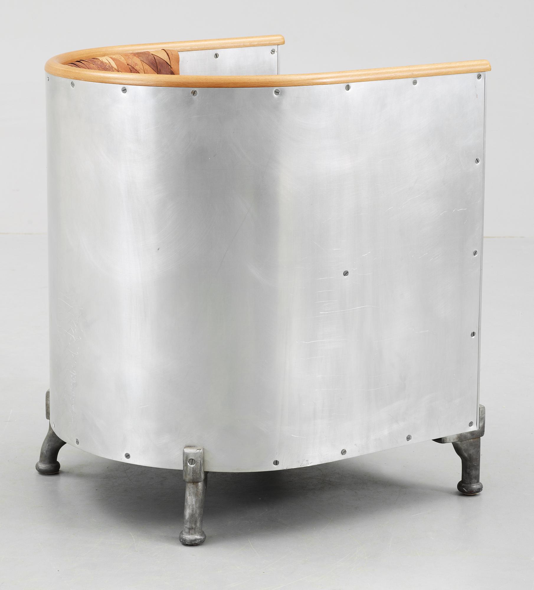 A Mats Theselius 'Aluminium' birch bark and aluminium easy chair, by Källemo, Sweden circa 1990.