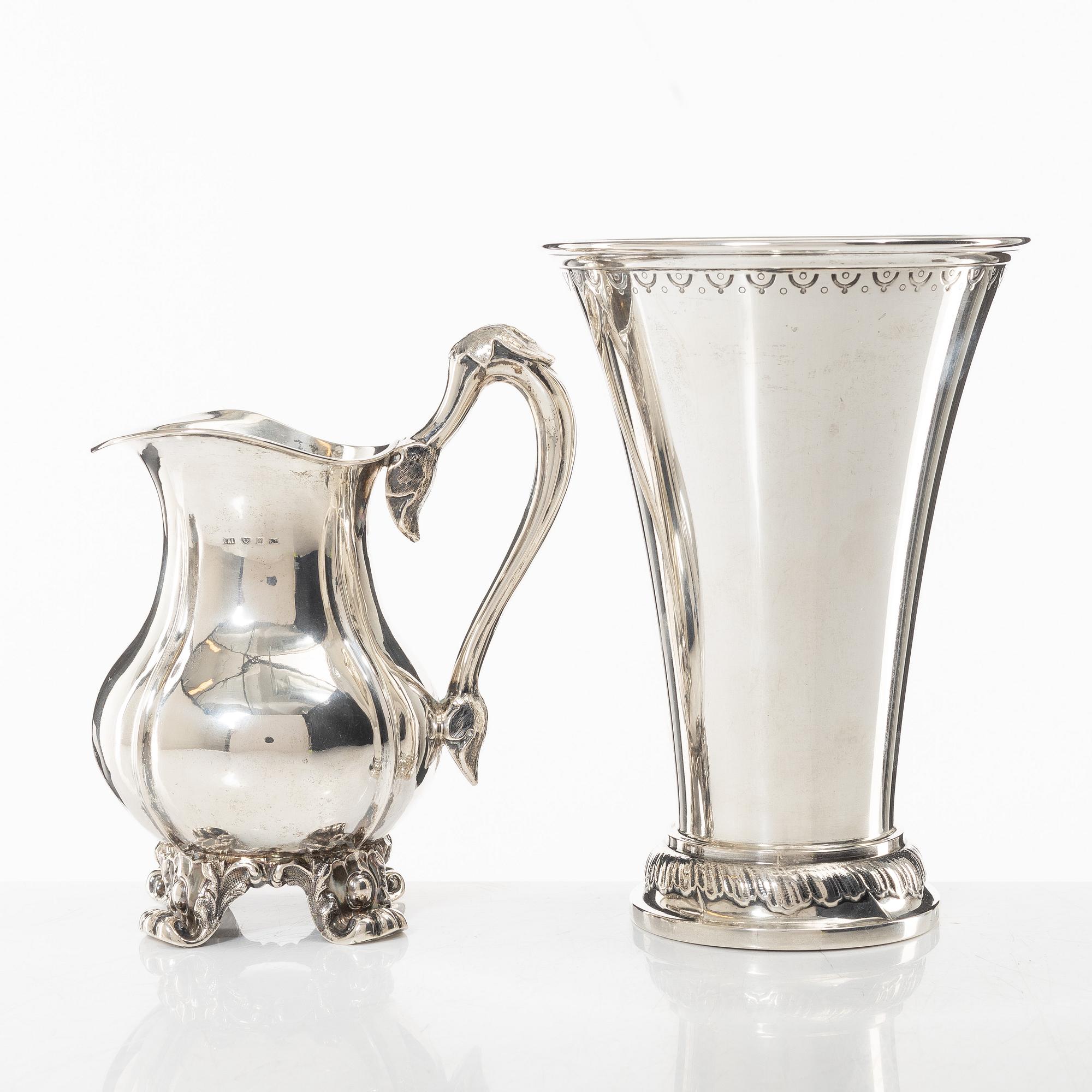 A Swedish silver beaker and a jug, including CG Hallberg, Stockholm 1927.