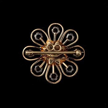 A BROOCH.