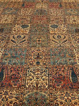 A CARPET. An old Kerman. 521 x 356 cm.