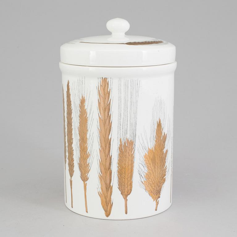 A porcelain jar with lid from Fornasetti, Italy.